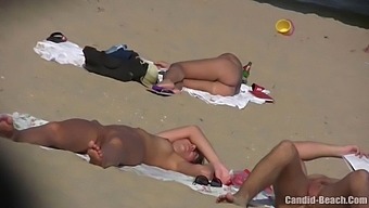 Real-Life Couples Baring It All In Candid Beach Encounter
